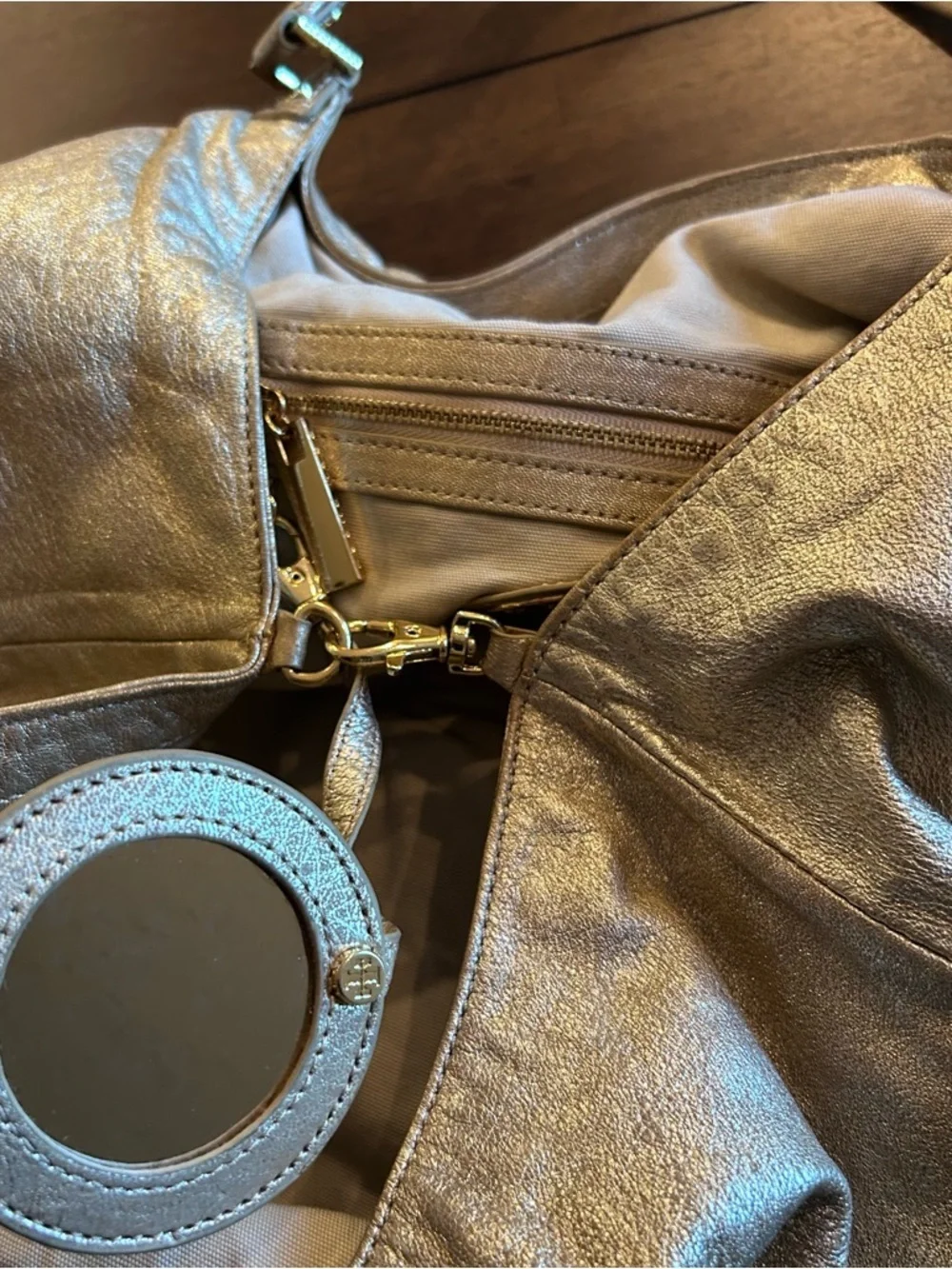 The Tory Burch Shimmer Gold Dean Hobo Bag MSRP 590.00